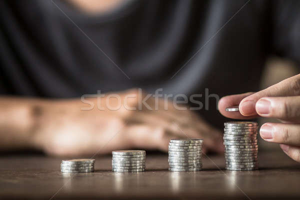 Gyűjt ezüst érmék pénz kezek üzlet Stock fotó © artrachen
