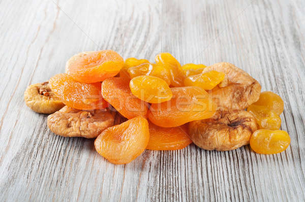Dried fruits on a wooden background Stock photo © Artspace