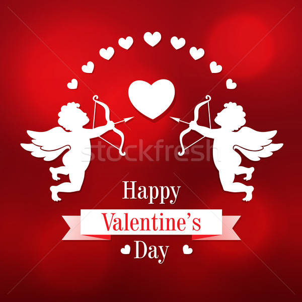 Paper cupids and hearts on a red background Stock photo © Artspace