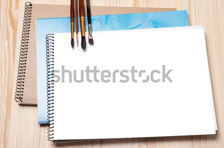 Blank notebook and brushes Stock photo © Artspace