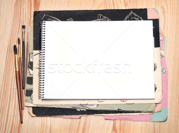 Notebook and brushes Stock photo © Artspace