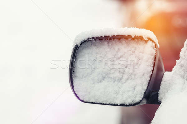 The car is all covered with snow. Snow on rearview mirror. Conce Stock photo © artsvitlyna