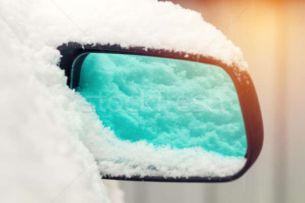 The car is all covered with snow. Snow on rearview mirror. Conce Stock photo © artsvitlyna
