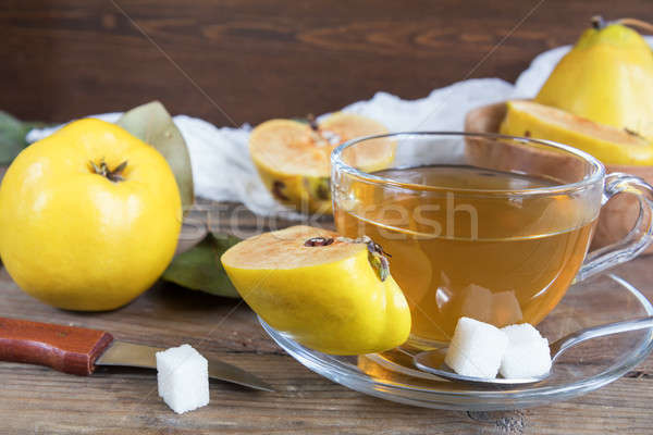 Fincan sıcak çay taze ayva meyve Stok fotoğraf © artsvitlyna