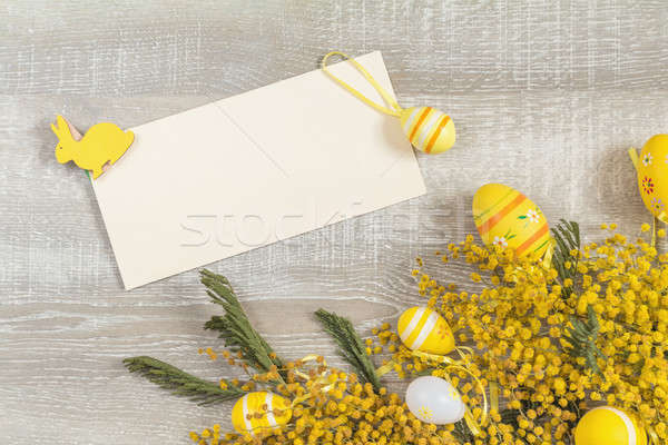 Stock photo: Easter holiday composition in yellow colors with spring flowers