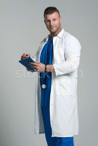 Caucasian mid adult male doctor Stock photo © arturkurjan