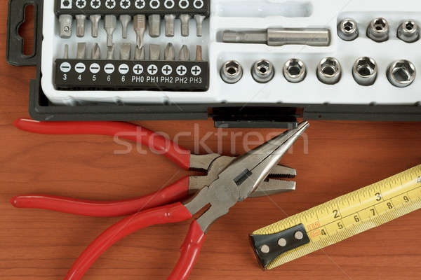 screwdriver toolbox with set of bits, pliers and measuring tape Stock photo © artush