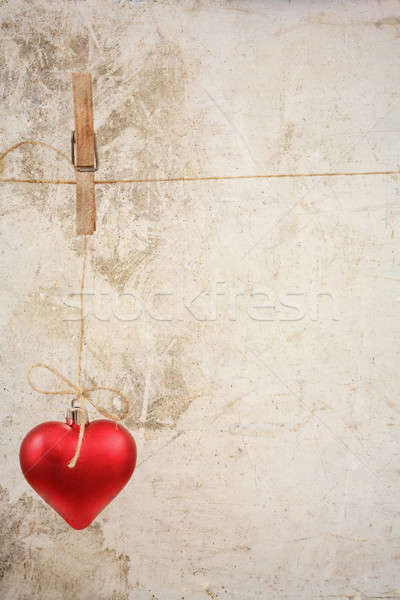 eart as a symbol of love/vintage card with red heart on Grunge vintage love/valentine background Stock photo © artush