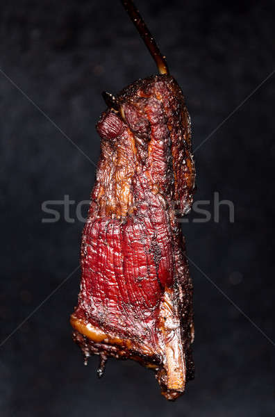 Smoking pork neck in home smokehouse Stock photo © artush