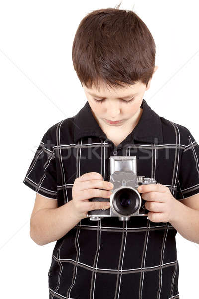Młody chłopak starych vintage analog kamery patrząc Zdjęcia stock © artush
