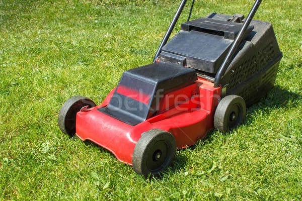 Lawnmower on grass Stock photo © artush