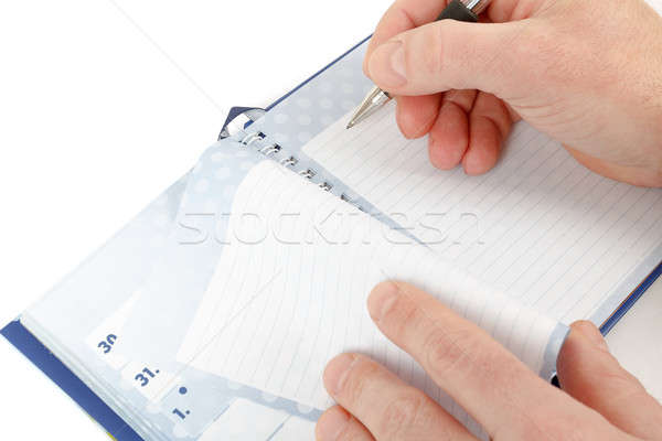 Primer plano mano principio escribir notas blanco Foto stock © artush
