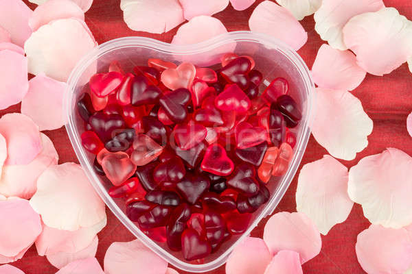 Rood harten Valentijn aanwezig rozenblaadjes achtergrond Stockfoto © artush