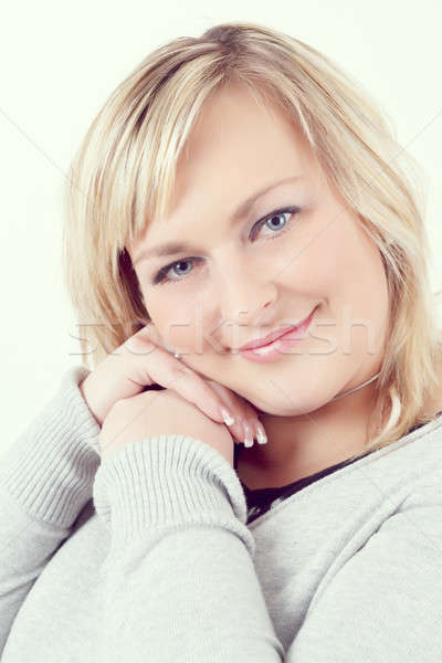 cute smiling relaxing plump woman Stock photo © artush