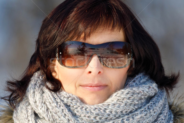 woman with sunglasses without makeup in winter time Stock photo © artush