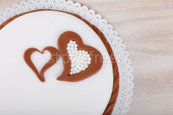 valentine love cake with hearts on wooden background Stock photo © artush