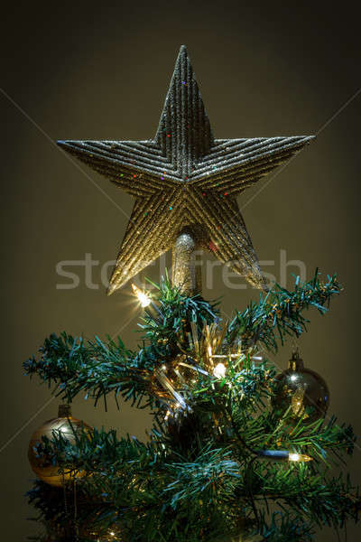 christmas star on tree with yellow and green balls  Stock photo © artush