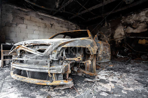 Stock photo: Close up photo of a burned out car