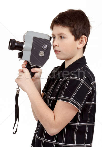 young boy with old vintage analog 8mm camera Stock photo © artush