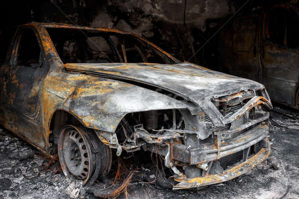 Close up photo of a burned out car Stock photo © artush