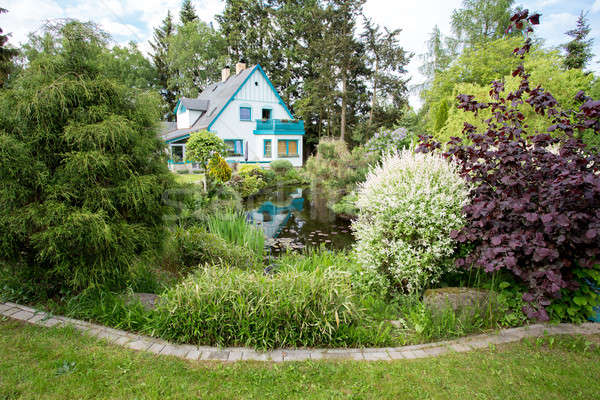 Beautiful house in spring garden Stock photo © artush