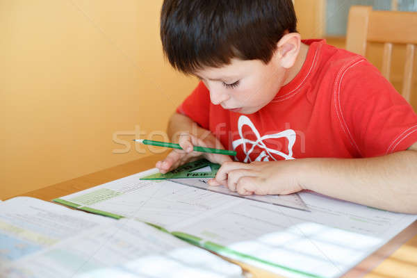 Chłopca szkoły praca domowa geometria matematyka skoroszyt Zdjęcia stock © artush