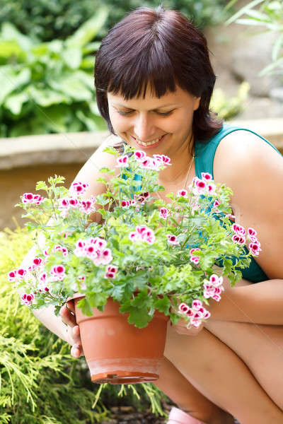 Feliz sonriendo centro edad mujer jardinería Foto stock © artush