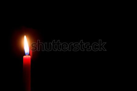 burning red candle with black background Stock photo © artush