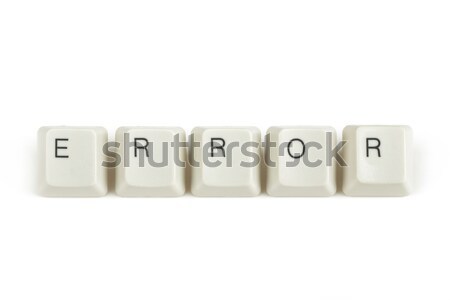 error from scattered keyboard keys on white Stock photo © artush