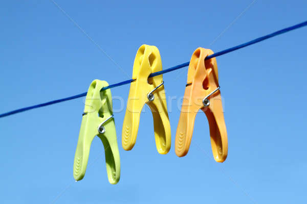cloth pegs with a under the blue sky Stock photo © artush