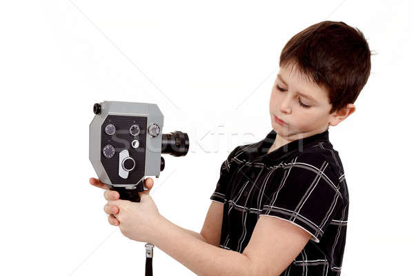 Młody chłopak starych vintage analog 8mm kamery Zdjęcia stock © artush