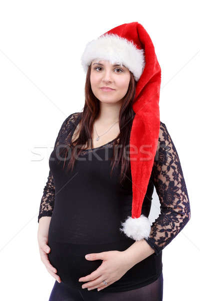 beautiful pregnant woman tenderly holding her tummy isolated on white background Stock photo © artush