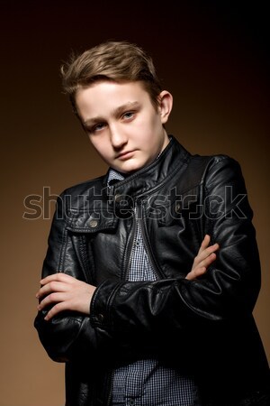 Porträt gut aussehend ansprechend junger Mann dunkel beige Stock foto © artush