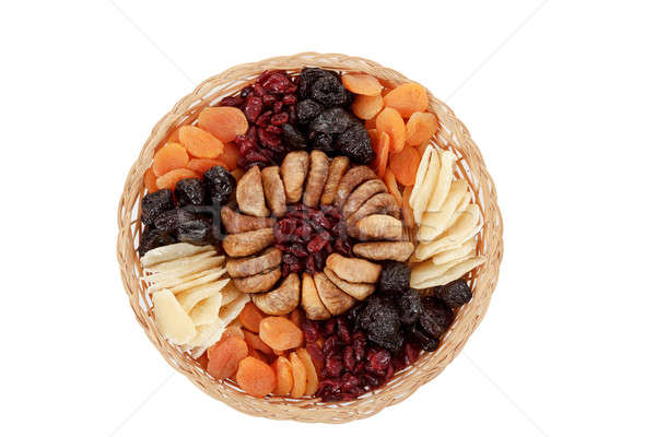 top view of various dried exotic fruits on white background Stock photo © artush