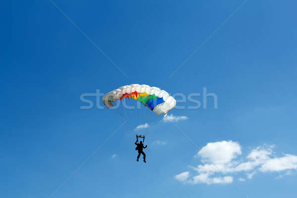 unidentified skydiver on blue sky Stock photo © artush