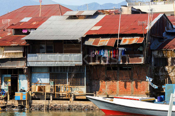 Szalmaszál szegény házak folyó lap konzervdoboz Stock fotó © artush