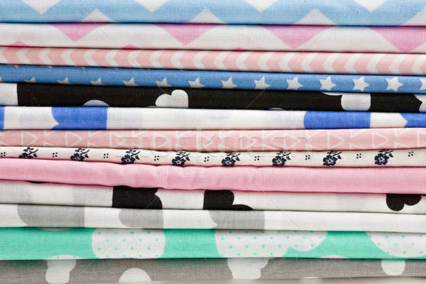Stack of cotton fabric material background Stock photo © artush