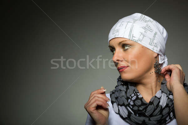 Stock photo: beautiful middle age woman cancer patient wearing headscarf