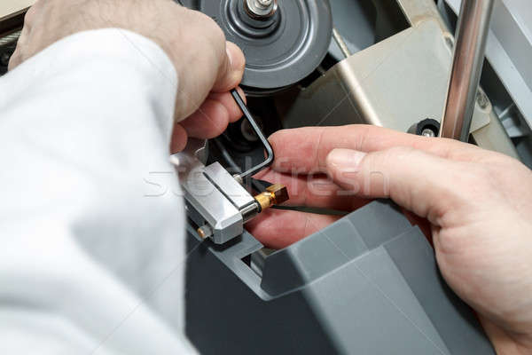 man repairs device Stock photo © artush
