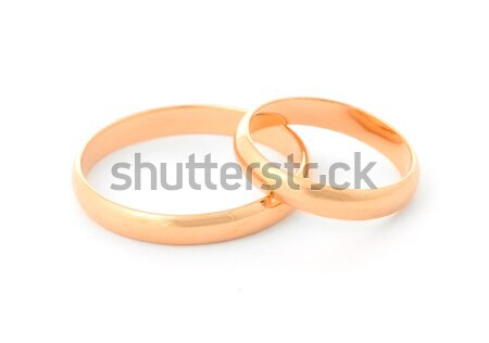 два золото кольцами изолированный белый свадьба Сток-фото © ashumskiy