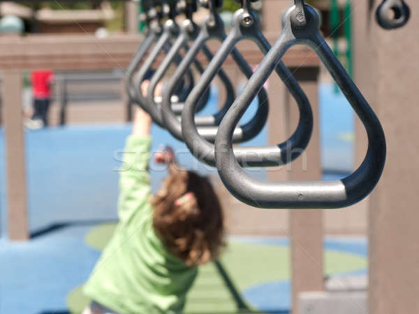 reaching for the monkey bar Stock photo © aspenrock