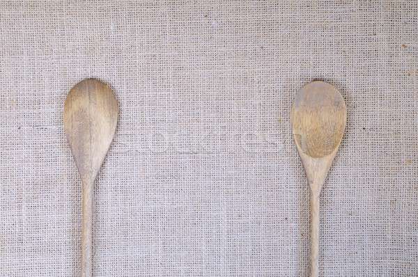 Burlap fabric with wooden spoons. Stock photo © asturianu