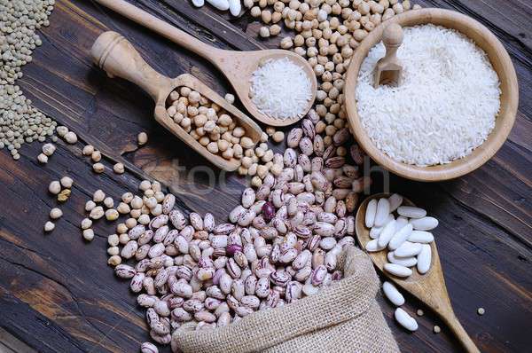 Stock photo: Close-up of raw cereals on wooden table