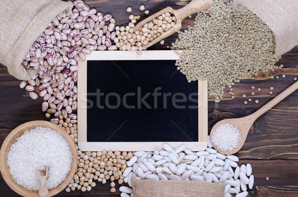 Diferente cereais mesa de madeira fundo quadro Foto stock © asturianu