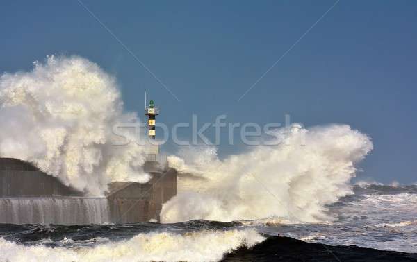 Stormy wave over lighthouse of San Esteban de Pravia.  Stock photo © asturianu