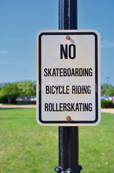 Sign prohibiting rollerskating and skateboards. Stock photo © asturianu