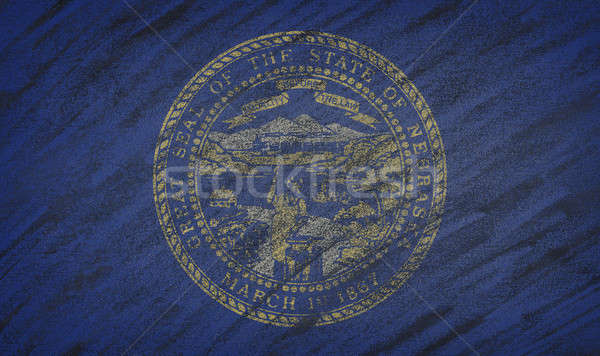 Stock photo: Nebraska flag painted with colored chalk on a blackboard. 