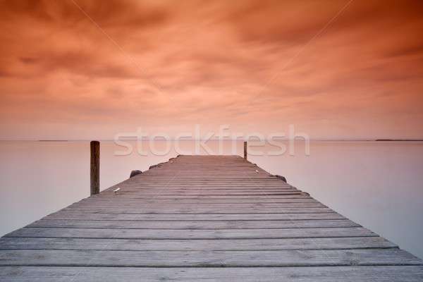 Wooden pier at sunset Stock photo © asturianu