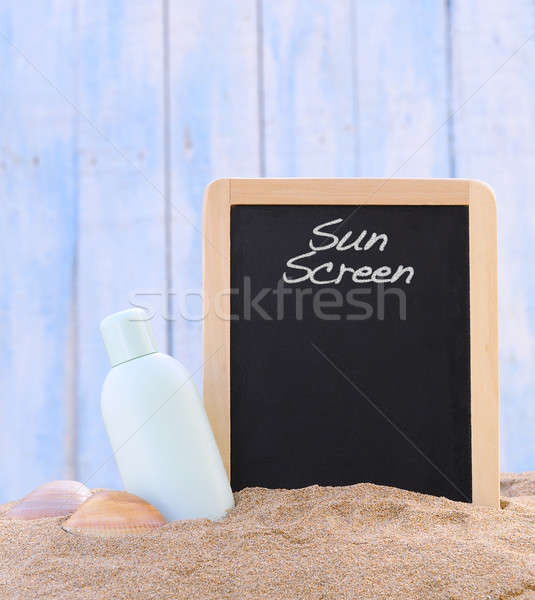 Sunscreen and blackboard. Stock photo © asturianu