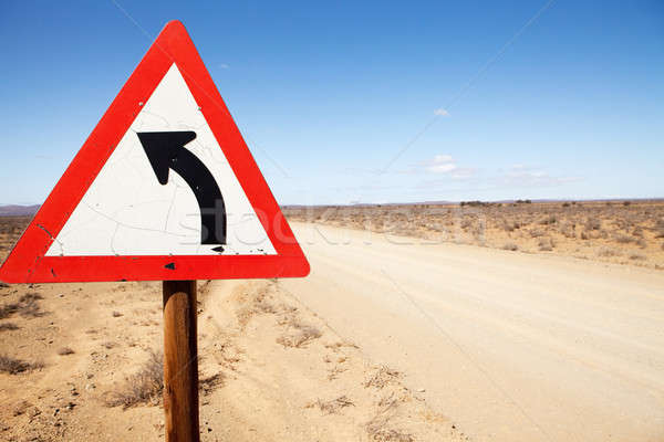 Znak drogowy obracać drogowego charakter pustyni Zdjęcia stock © avdveen